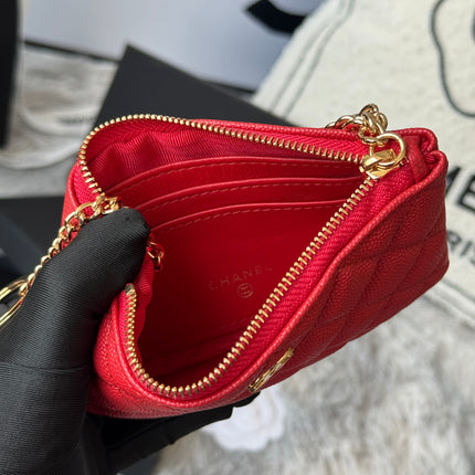 CC CLASSIC ZIPPED POUCH 14 IN RED GRAINED CALFSKIN GOLD-TONE CHARM CHAIN