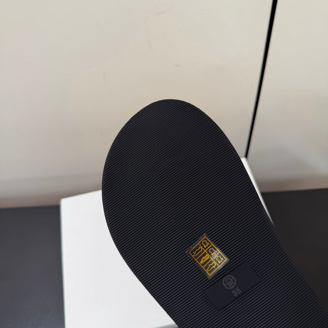 THE ROW 26S CROSS STRAP SANDALS IN BLACK CALFSKIN
