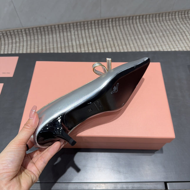 MIUMIU 26S POINTED TOE PUMPS 55MM IN SILVER CALFSKIN WITH BOW
