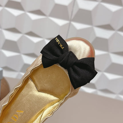PRADA 26S ROUND TOE FLATS WITH BOW IN GOLD CALFSKIN