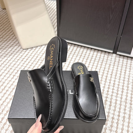 CHANEL 26S LOAFER MULES IN BLACK CALFSKIN