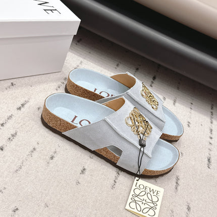 LOEWE 26S FLAT SANDALS IN LIGHT BLUE LOGO GOLD HARDWARE