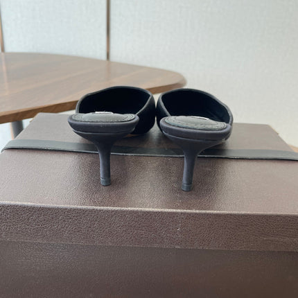 ALAIA 26S HEELED MULES 50 MM IN BLACK FABRIC