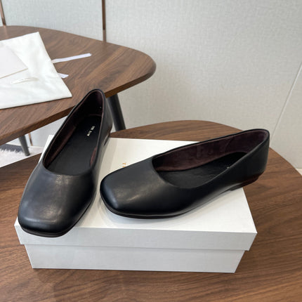 THE ROW 26S FLATS IN BLACK CALFSKIN
