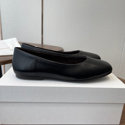 THE ROW 26S FLATS IN BLACK CALFSKIN