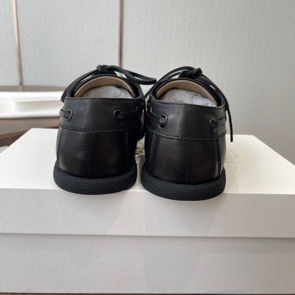 THE ROW 26S LOAFERS IN BLACK CALFSKIN