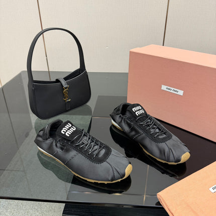 MIUMIU 25S SNEAKERS IN BLACK PLUME SATIN