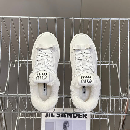 MIUMIU 25S SNEAKERS IN WHITE SUEDE WITH SHEARLING