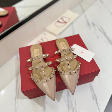VALENTINO 26S STUDDED FLAT MULES IN NUDE PATENT CALFSKIN