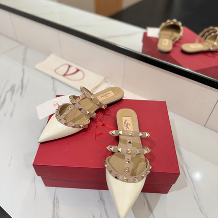 VALENTINO 26S STUDDED FLAT MULES IN WHITE PATENT CALFSKIN