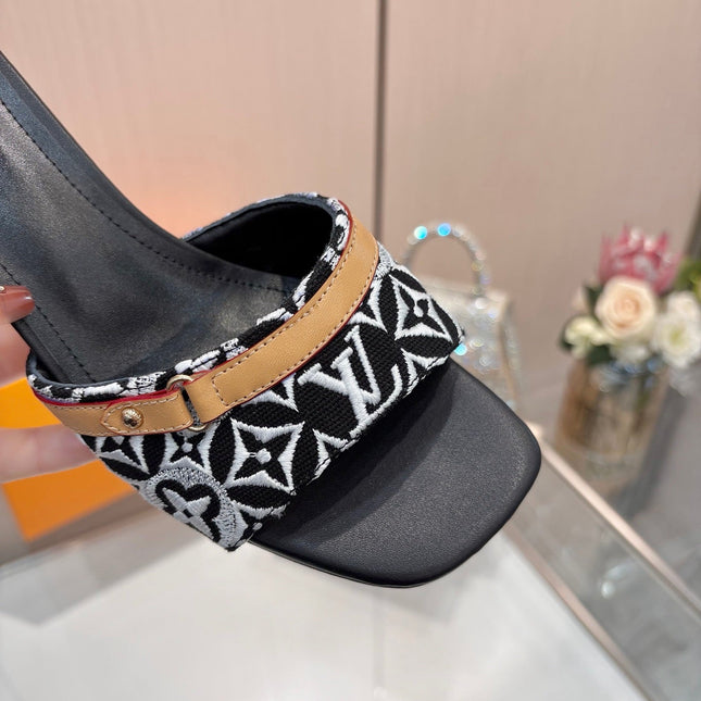 LV 26S HIGH-HEELED MULES 55 MM IN BLACK AND WHITE EMBROIDERED MONOGRAM CANVAS