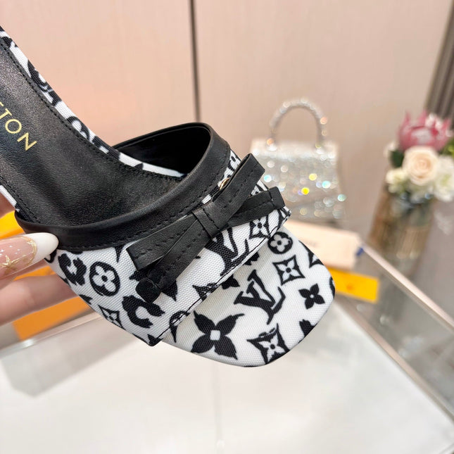 LV 26S HIGH-HEELED MULES 55 MM IN WHITE AND BLACK MONOGRAM CANVAS STYLE 2