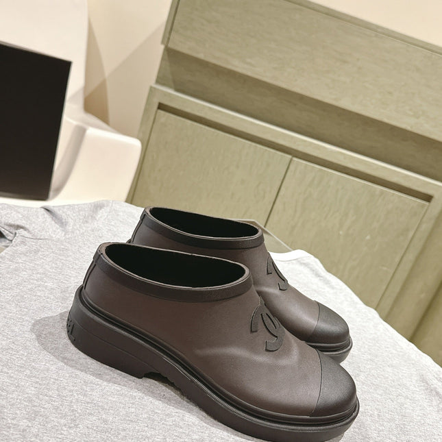 CC RAIN BOOTS IN BROWN AND BLACK TPU