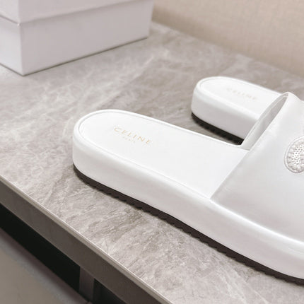 THICK-SOLED SLIDES IN WHITE SMOOTH LAMBSKIN LOGO WITH CRYSTALS