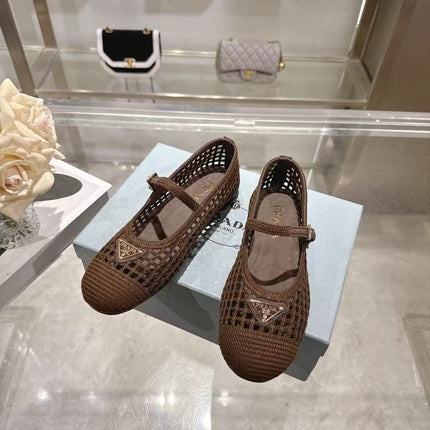 PRADA 26S LOGO PLAQUE MARY JANE FLATS IN DARK BROWN WOVEN FIBER