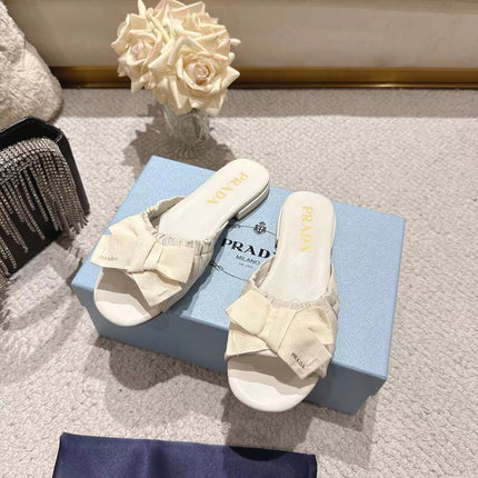 PRADA 26S RUCHED BOW SLIDE SANDALS IN CREAM WHITE CALFSKIN