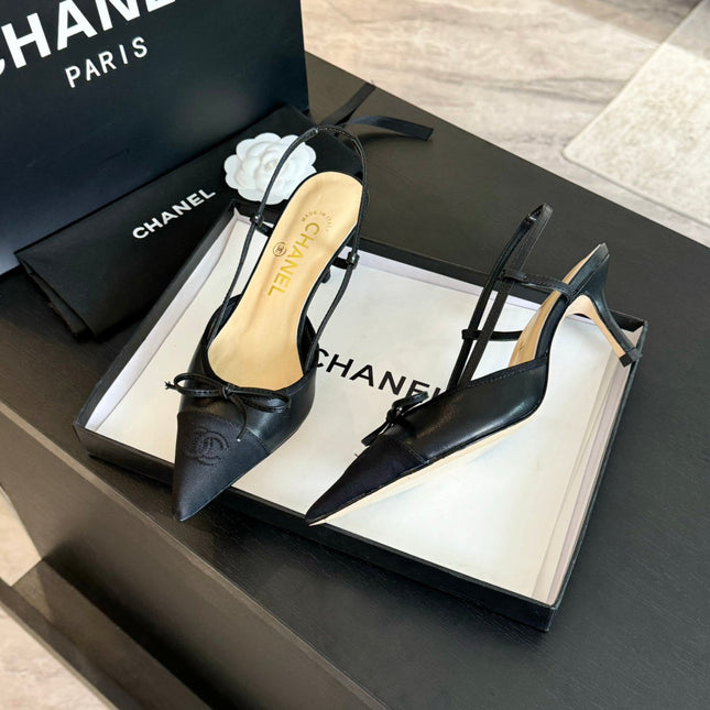 SLINGBACK WITH BOW IN BLACK LAMBSKIN