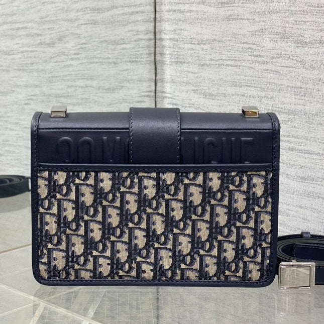 MONTAIGNE EAST-WEST 24 BAG WITH CHAIN IN NAVY BLUE LAMBSKIN AND MONOGRAM JACQUARD