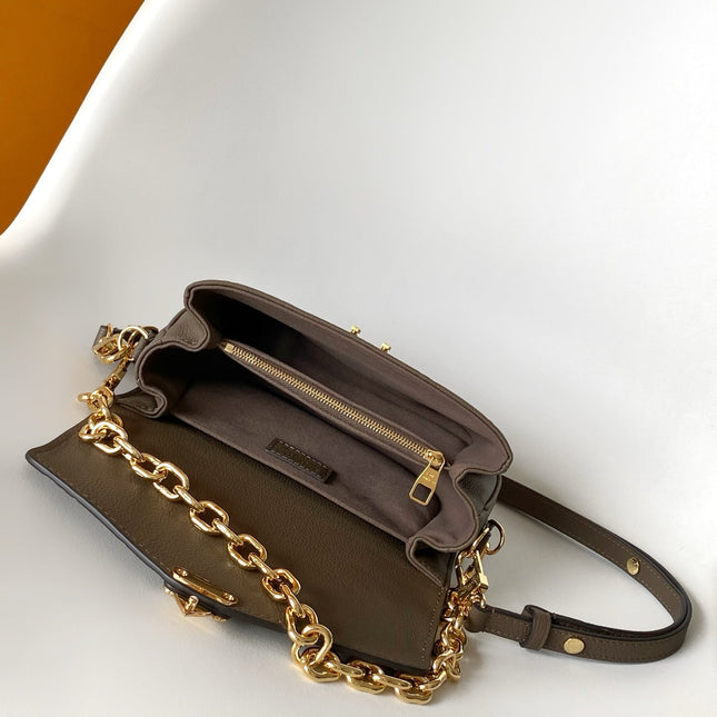 POCHETTE METIS EAST WEST 22 IN BROWN MONOGRAM EMBOSSED CALFSKIN