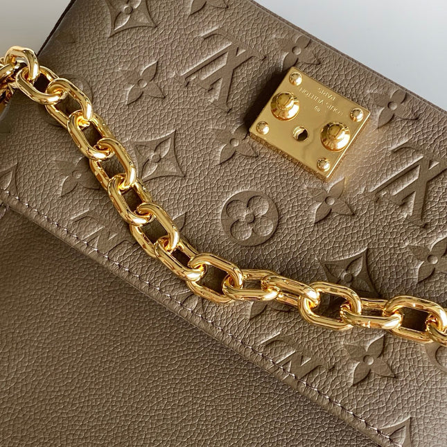 POCHETTE METIS EAST WEST 22 IN BROWN MONOGRAM EMBOSSED CALFSKIN