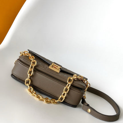 POCHETTE METIS EAST WEST 22 IN BROWN MONOGRAM EMBOSSED CALFSKIN