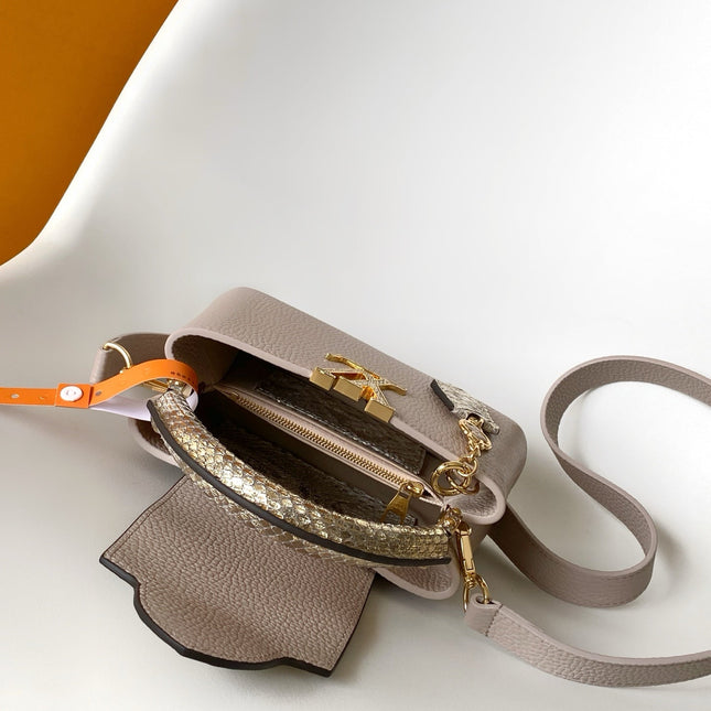 LV 26S CAPUCINES BAG 21 IN GRAYISH BEIGE TAURILLON CALFSKIN WITH GOLD HARDWARE