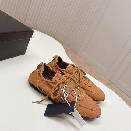 PRADA 26S LACE UP MINIMAL SNEAKERS IN CARAMEL BROWN CANVAS