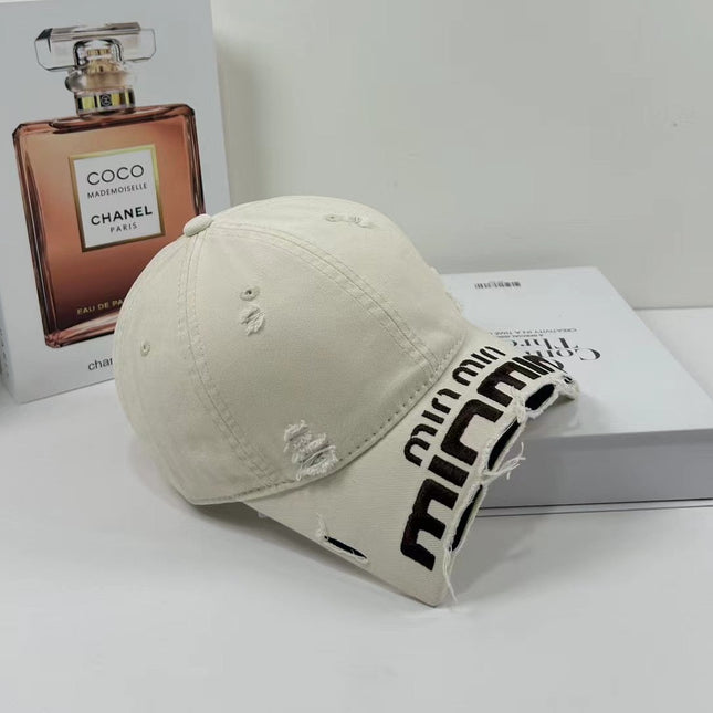 MIUMIU DISTRESSED EMBROIDERED BASEBALL CAP DENIM