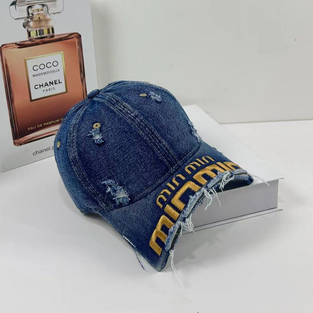 MIUMIU DISTRESSED EMBROIDERED BASEBALL CAP DENIM