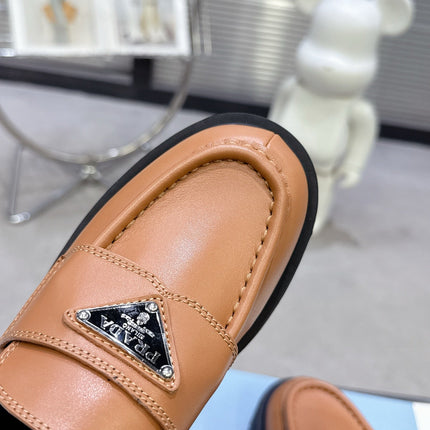 PRADA 25S THICK-SOLE LOAFERS 60 MM IN COGNAC BROWN CALFSKIN