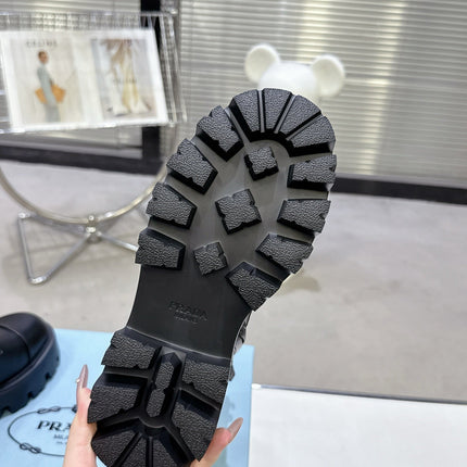 PRADA 25S WARRIOR BOOTS IN BLACK CALFSKIN