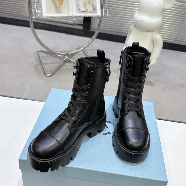 PRADA 25S WARRIOR BOOTS IN BLACK CALFSKIN