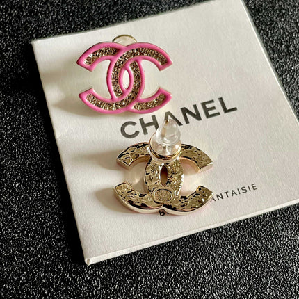 DOUBLE C STUD EARRINGS WITH PINK TRIM AND CENTER STONE