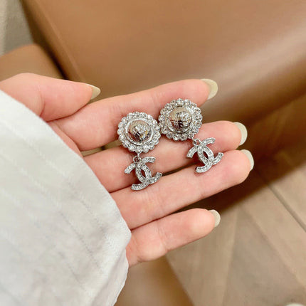 CHANEL 26S DOUBLE C LOGO CRYSTAL HALO DROP EARRINGS IN SILVER METAL 629987