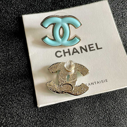 CHANEL 26S DOUBLE C LOGO TURQUOISE ENAMEL STUD EARRINGS IN GOLD METAL 630067
