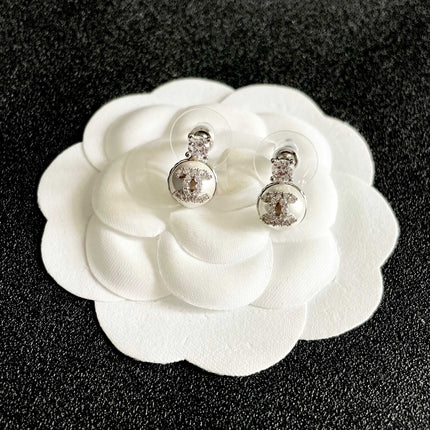 CHANEL 26S DOUBLE C ICON CRYSTAL STUD EARRINGS WITH PAVE LOGO DISC IN SILVER METAL 630076