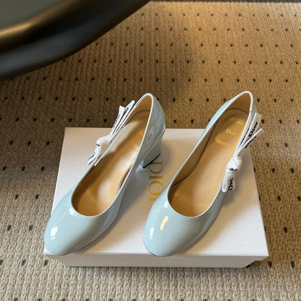 DIOR 26S HIGH HEELS 80 MM IN LIGHT BLUE PATENT CALFSKIN WITH RIBBON BOW