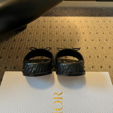DIOR 26S SLIDES IN BLACK CALFSKIN WITH BOW