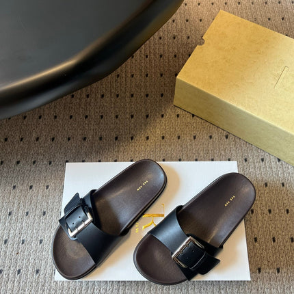 THE ROW 26S BUCKLE SLIDE SANDALS IN BLACK CALFSKIN