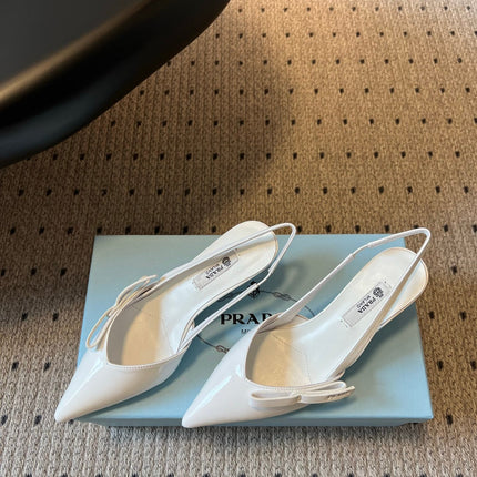 PRADA 26S BOW DETAIL SLINGBACK PUMPS 55MM IN WHITE PATENT CALFSKIN