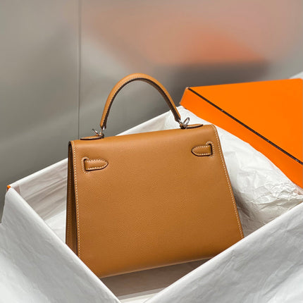 KELLY 25CM IN GOLD EPSOM CALFSKIN SILVER HARDWARE