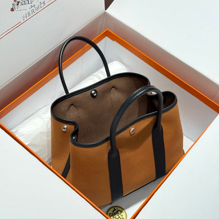 GARDEN PARTY 30CM IN ORANGE MINIMUM TOILETS COTTON CANVAS AND BLACK CALFSKIN
