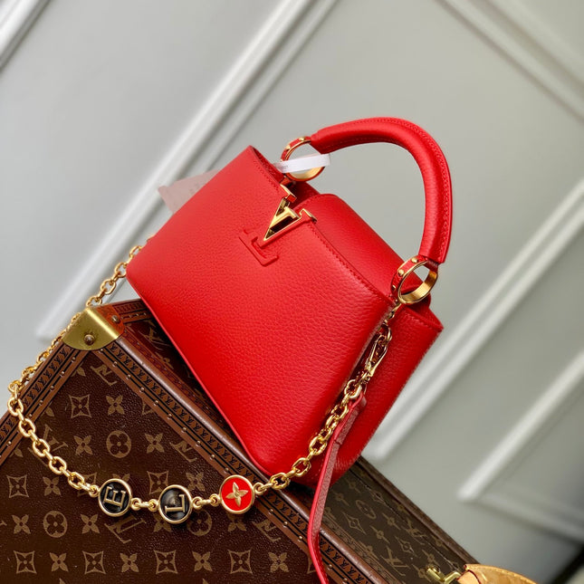 CAPUCINES MINI 23 IN RED TAURILLON GOLD HARDWARE