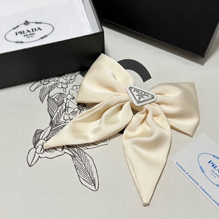 BOW-KNOT HAIR CLIP IN EGG SHELL SILK 358294
