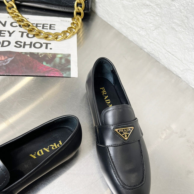 PRADA 26S CLASSIC LOAFERS IN BLACK CALFSKIN WITH LOGO