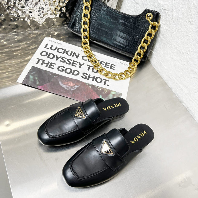 PRADA 26S MULE LOAFERS IN BLACK CALFSKIN WITH LOGO