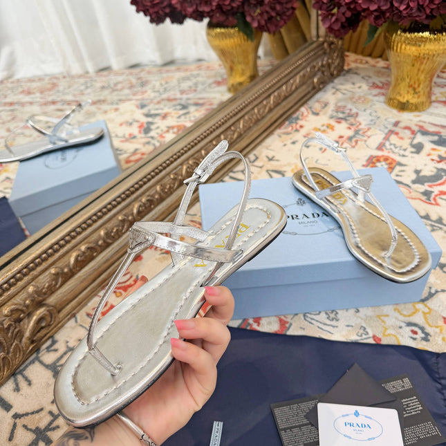 PRADA 26S THONG SANDALS IN SILVER CALFSKIN TRIANGLE LOGO