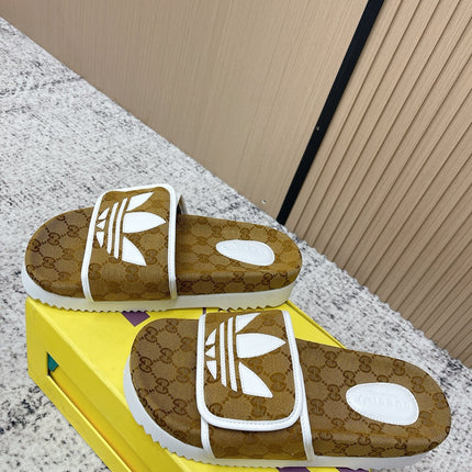 GUCCI 26S PLATFORM SLIDE SANDALS IN BROWN GG CANVAS