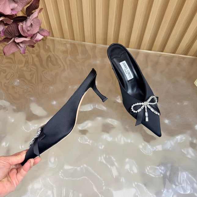 JIMMY CHOO 26S HIGH-HEELED MULES 65 MM IN BLACK SATIN WITH RHINESTONE BOW