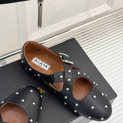 CROSSED STRAP BALLET FLATS IN BLACK CALFSKIN